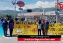 Normalistas de Ayotzinapa bloquean la Autopista del Sol y retienen 5 autobuses